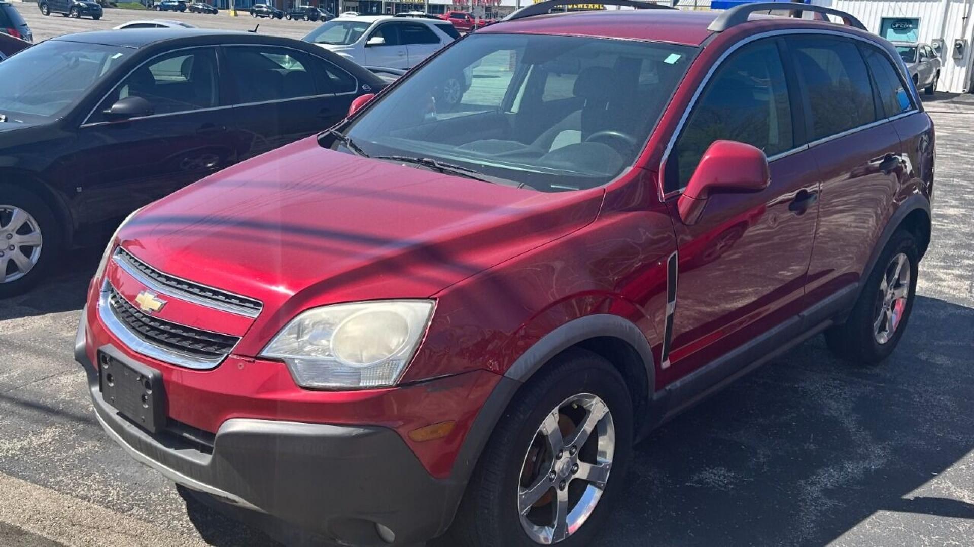 2012 MAROON Chevrolet Captiva Sport (3GNAL2EK5CS) , located at 2710A Westlane Rd., Indianapolis, IN, 46268, (317) 291-2000, 39.885670, -86.208160 - Photo#1